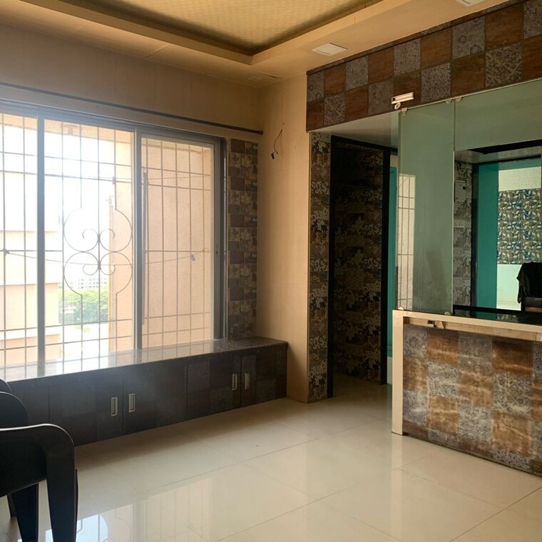 Living Room, vastu-acharya-ashram 1.5 Bedroom 460 Sq.Ft. Apartment In Vazira Mumbai 10412091