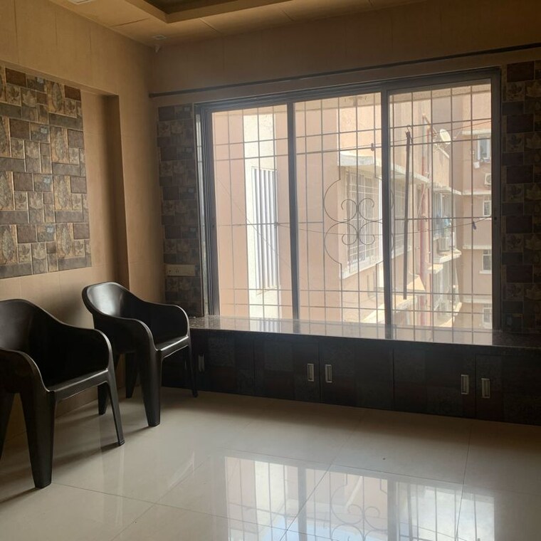 Living Room, vastu-acharya-ashram 1.5 Bedroom 460 Sq.Ft. Apartment In Vazira Mumbai 10412091