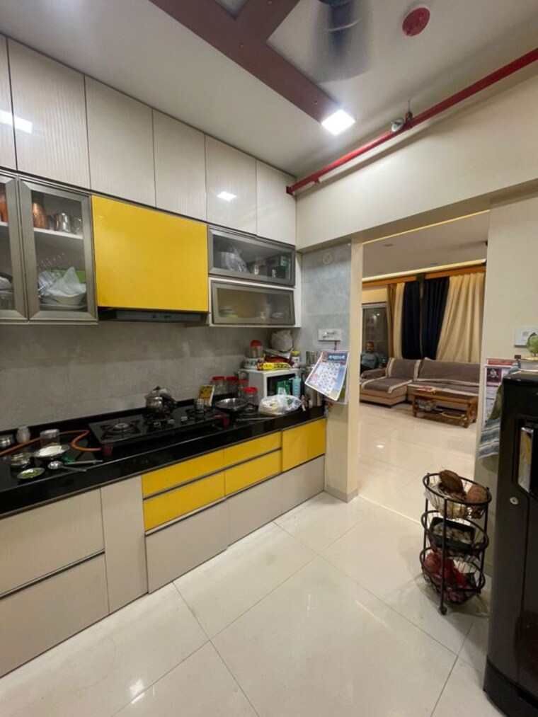 Kitchen, bhandari-7-plumeria-drive 3 Bedroom 1510 Sq.Ft. Apartment In Tathawade Pune 10421056