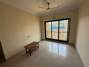 Room in 2 BHK Apartment at K Raheja Heights, Malad East – for Rent