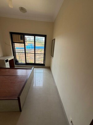 Bedroom in 2 BHK Apartment at K Raheja Heights, Malad East – for Rent