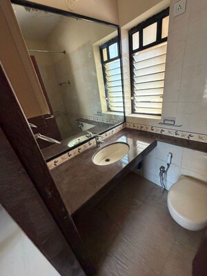 Bathroom in 2 BHK Apartment at K Raheja Heights, Malad East – for Rent