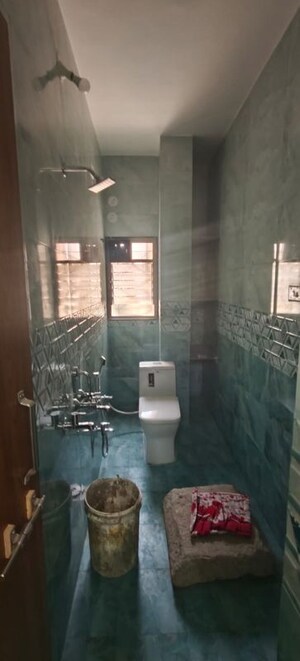 Bathroom in 2 BHK Apartment at Sainikwadi – for Rent