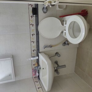 Bathroom in 1 BHK Apartment at K Raheja Heights, Malad East – for Rent