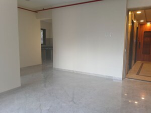 Living Room in 2 BHK Apartment at Ajmera Boulevard, Malad West – for Rent