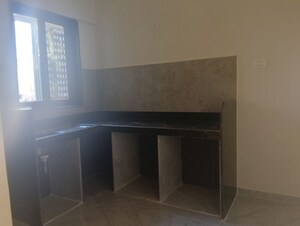 Kitchen in 2 BHK Apartment at Ajmera Boulevard, Malad West – for Rent