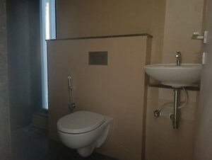 Bathroom in 2 BHK Apartment at Ajmera Boulevard, Malad West – for Rent