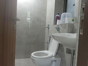 Bathroom in 1 BHK Apartment at Sheth Irene, Malad West – for Rent