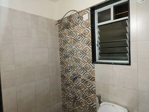 Bathroom in 1 BHK Apartment at Adhya Radhakrishna, Moshi – for Rent