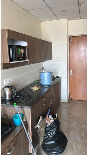 Kitchen in Studio Apartment at Paramount Golf Forest Studio Apartments - OAK Towe, Zeta I Greater Noida – for Rent