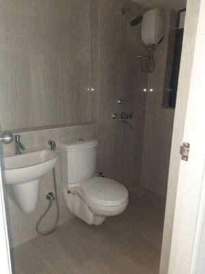 Bathroom in 1.5 BHK Apartment at Runwal Gardens, Dombivli East – for Rent