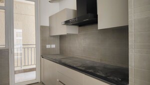 Kitchen in 3 BHK Apartment at Ace Starlit, Sector 152 – for Rent