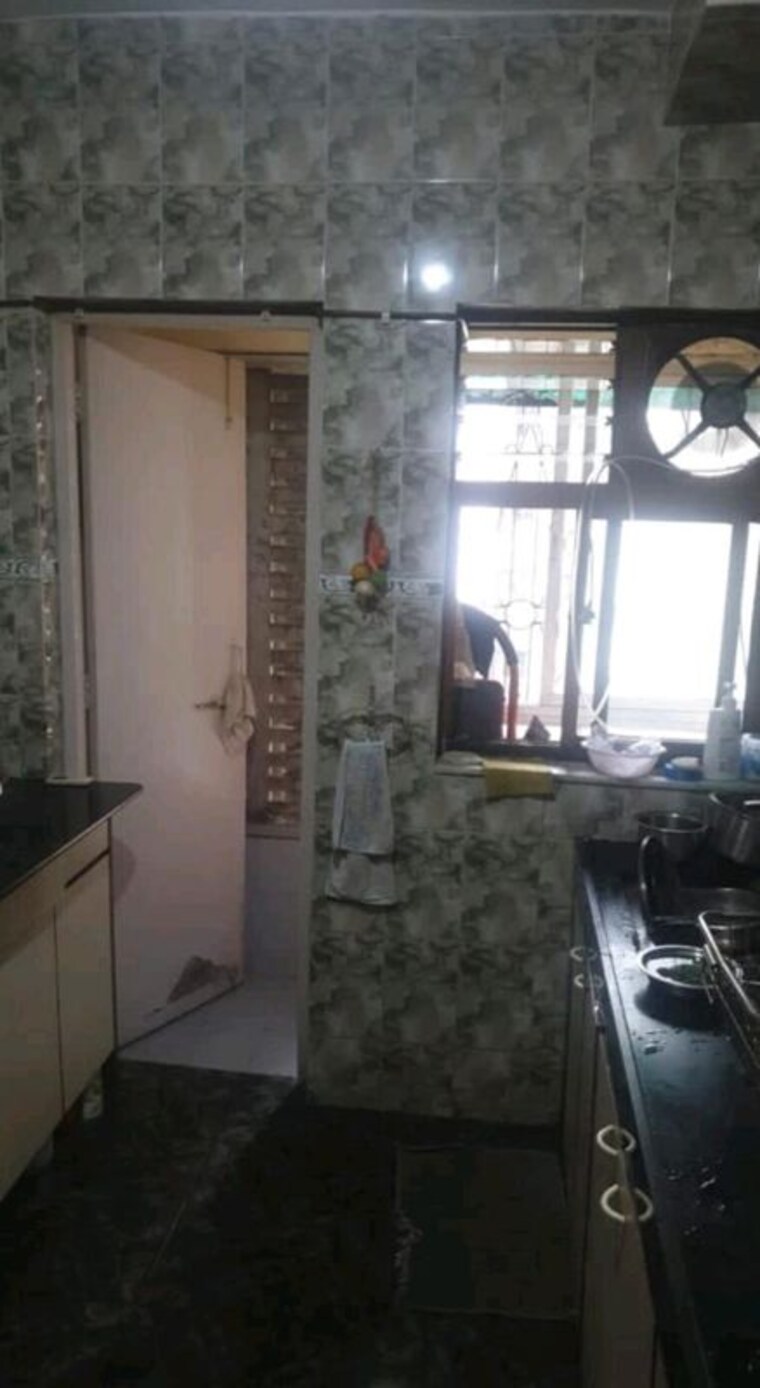 Kitchen, lokhandwala-whispering-palms 2 Bedroom 850 Sq.Ft. Apartment In Kandivali East Mumbai 10421722