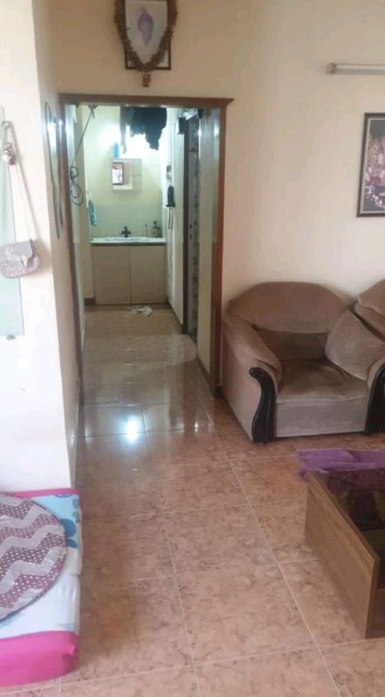 Living Room, lokhandwala-whispering-palms 2 Bedroom 850 Sq.Ft. Apartment In Kandivali East Mumbai 10421722