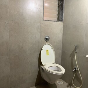 Bathroom in 3 BHK Apartment at Greenfield Om Satyam Niwas CHS, Dalvi Nagar – for Rent