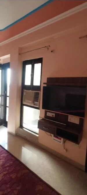 Living Room in 2 BHK Apartment at Ansal Palam Triangle, Palam Vihar Extension – for Rent