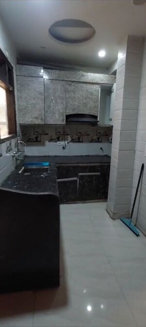 Kitchen in 2 BHK Apartment at Ansal Palam Triangle, Palam Vihar Extension – for Rent