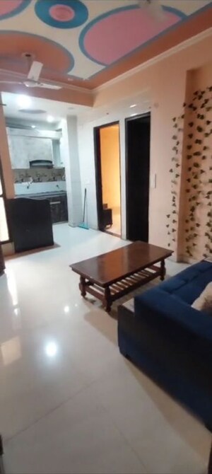 Living Room in 2 BHK Apartment at Ansal Palam Triangle, Palam Vihar Extension – for Rent