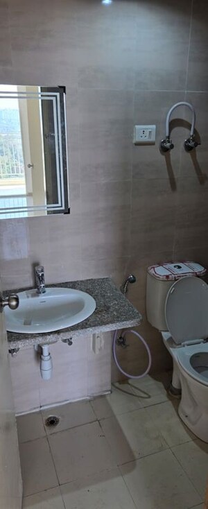 Bathroom in 2 BHK Apartment at Mahagun Mantra II, Sector 10 Greater Noida – for Rent