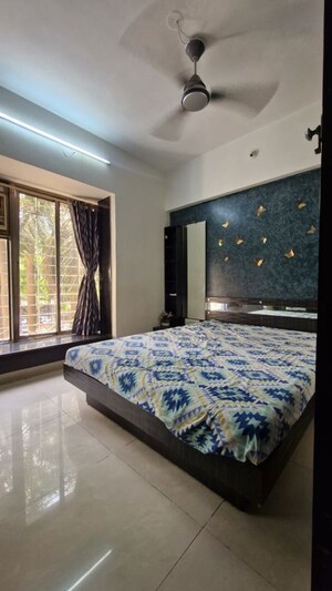 Bedroom in 2 BHK Apartment at Shree Mahavir Darshan CHS Kandivali West, Kandivali West – for Rent