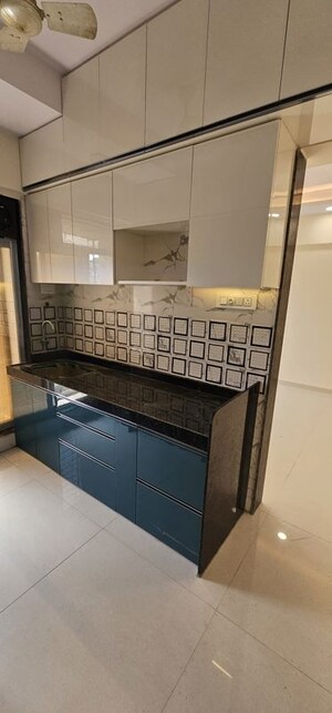 Kitchen in 2 BHK Apartment at Divya Smruthi, Malad West – for Rent