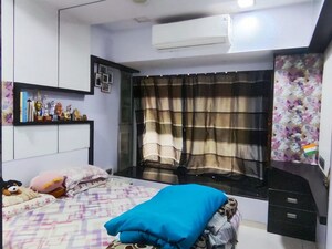 Bedroom in 2 BHK Apartment at Divya Smruthi, Malad West – for Rent