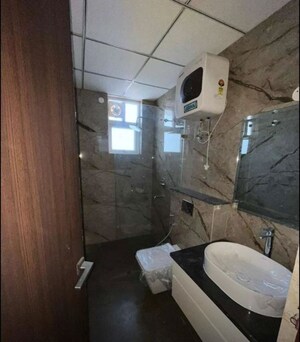 Bathroom in 3 BHK Apartment at Maya Green Lotus Utsav, International Airport Road – for Rent