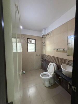 Bathroom in 2 BHK Apartment at Rama Capriccio Phase I, Wakad – for Rent
