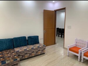 Living Room in 2 BHK Apartment at Express Garden, Vaibhav Khand – for Rent