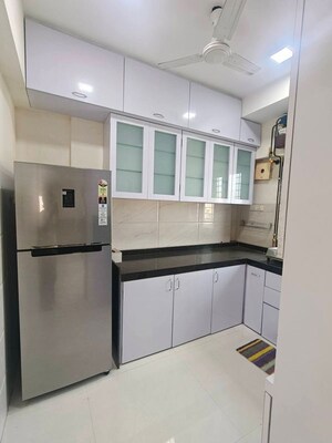 Kitchen in 2 BHK Apartment at DLH Metroview, Andheri West – for Rent