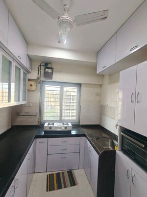 Kitchen in 2 BHK Apartment at DLH Metroview, Andheri West – for Rent