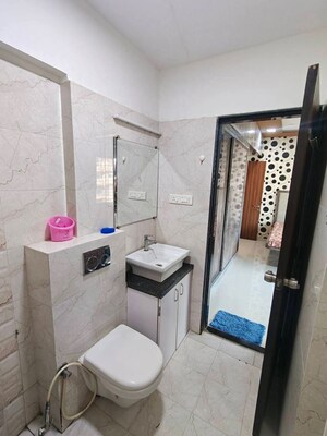 Bathroom in 2 BHK Apartment at DLH Metroview, Andheri West – for Rent