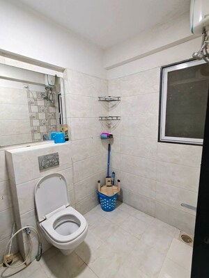 Bathroom in 2 BHK Apartment at DLH Metroview, Andheri West – for Rent