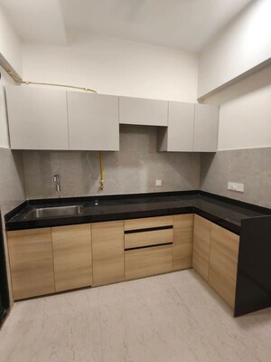 Kitchen in 2.5 BHK Apartment at Our Home CHS, Andheri West – for Rent