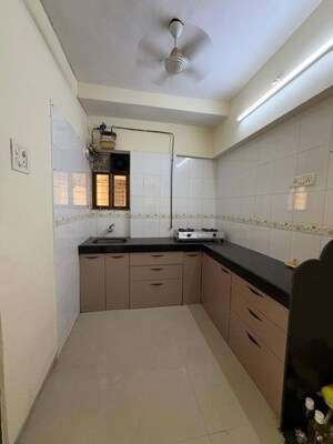 Kitchen in 2 BHK Apartment at Gokul Panchavati Apartment, Andheri West – for Rent