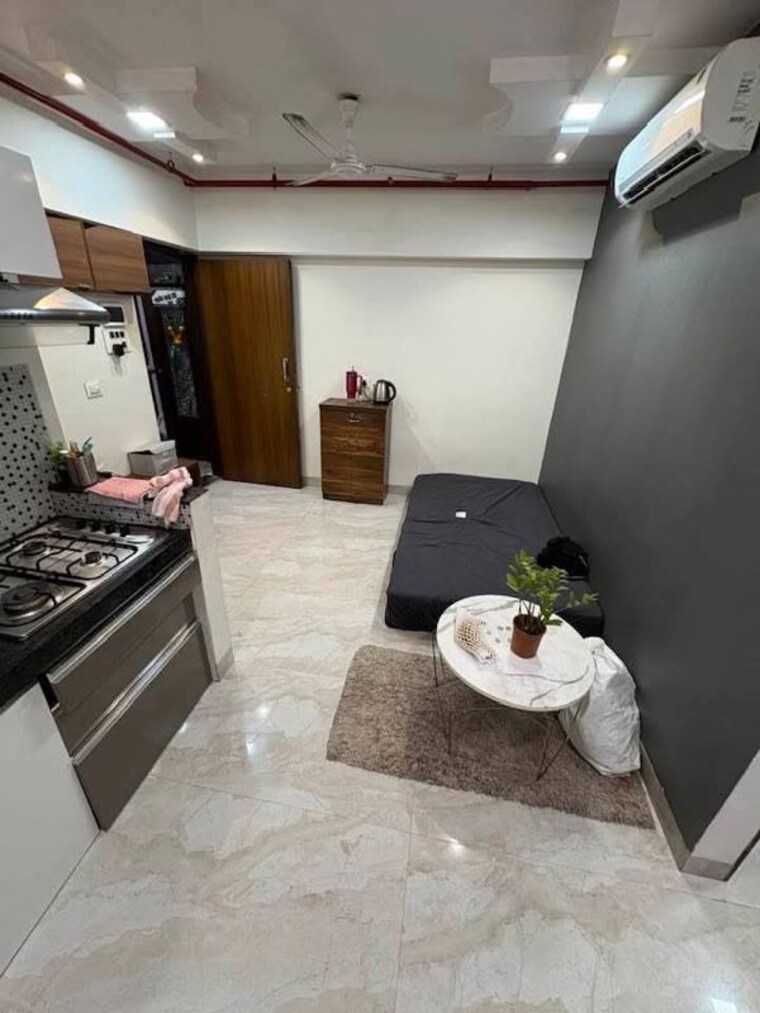 Living Room, platinum-tower-1 2 Bedroom 580 Sq.Ft. Apartment In Andheri West Mumbai 10423200