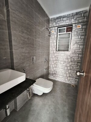 Bathroom in 2 BHK Apartment at Mahavir Square, Manpada – for Sale