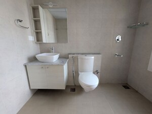 Bathroom in 3 BHK Apartment at Bhartiya City Nikoo Homes 4, Thanisandra Main Road – for Rent