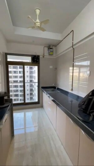 Kitchen in 1 BHK Apartment at Je And Vee Om Trimurti, Malad East – for Rent