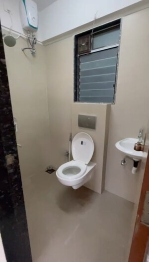 Bathroom in 1 BHK Apartment at Je And Vee Om Trimurti, Malad East – for Rent