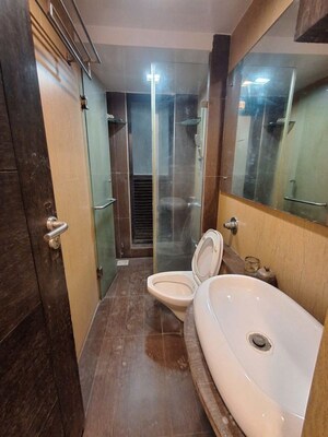 Bathroom in 4 BHK Apartment at L Nagpal Bhagwanti Heights, Khar West – for Rent