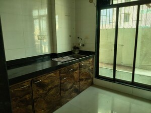 Kitchen in 1 BHK Apartment at Geetanjali Heights, Seawoods – for Rent