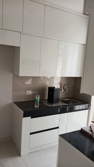 Kitchen in 2 BHK Apartment at Eldeco Live By The Greens, Sector 150 – for Rent