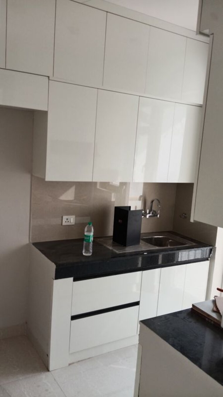 Kitchen, eldeco-live-by-the-greens 2 Bedroom 1137 Sq.Ft. Apartment In Sector 150 Noida 10423341