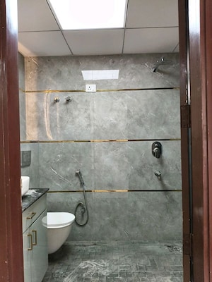 Bathroom in 3 BHK Apartment at Orchid Petals, Sector 49 – for Rent