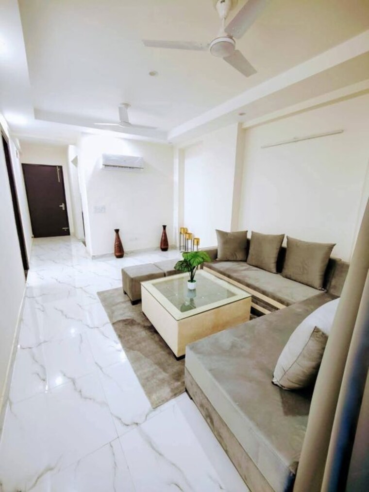 Living Room, bptp-amstoria 4 Bedroom 250 Sq.Yd. Apartment In Sector 102 Gurgaon 10423352