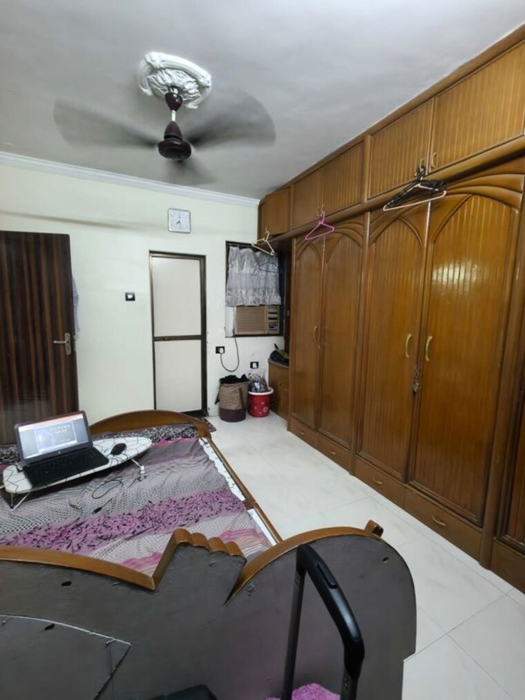 Bedroom, ambika-chs-nerul 3 Bedroom 1100 Sq.Ft. Apartment In Nerul Sector 19 Navi Mumbai 10423354