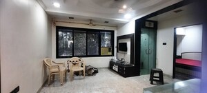 Living Room in 2 BHK Apartment at Neet Kirtan CHS, Andheri West – for Rent