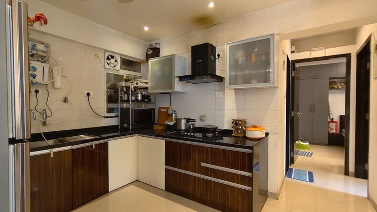 Kitchen, kamgar putala vasahat 2 Bedroom 1020 Sq.Ft. Apartment In Kamgar Putala Vasahat Pune 10423390