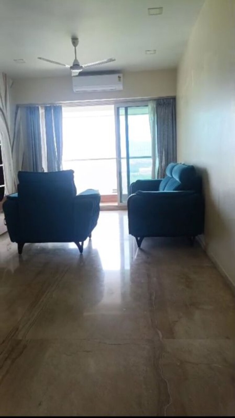 Living Room, ajmera-zeon 2 Bedroom 925 Sq.Ft. Apartment In Bhakti Park Mumbai 10423383